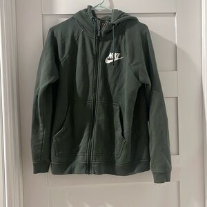 Size medium, NIKE zip up jacket in green.